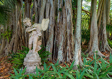 Photo of a statue in a garden. Link to Gifts of Appreciated Securities
