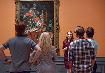 Photo of people in a gallery tour. Links to Gifts from Retirement Plans